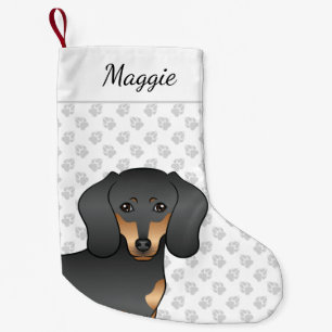 Glattes Schwarz-Tan-Dachshund-Hund mit süßem Kopf Kleiner Weihnachtsstrumpf