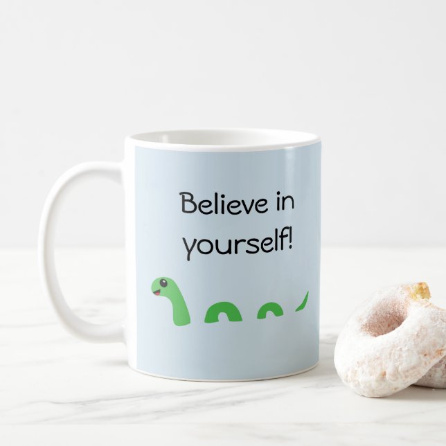 Glauben Sie an Ihren eigenen Cartoon Loch Ness Mon Kaffeetasse (Mit Donut)