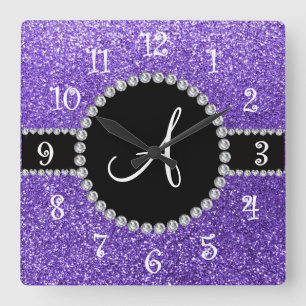 Glitterdiamantschwarzkreis des Monogramms lila Quadratische Wanduhr
