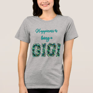 Glück bedeutet, eine Feder von Gigi Peacock zu sei Tri-Blend Shirt