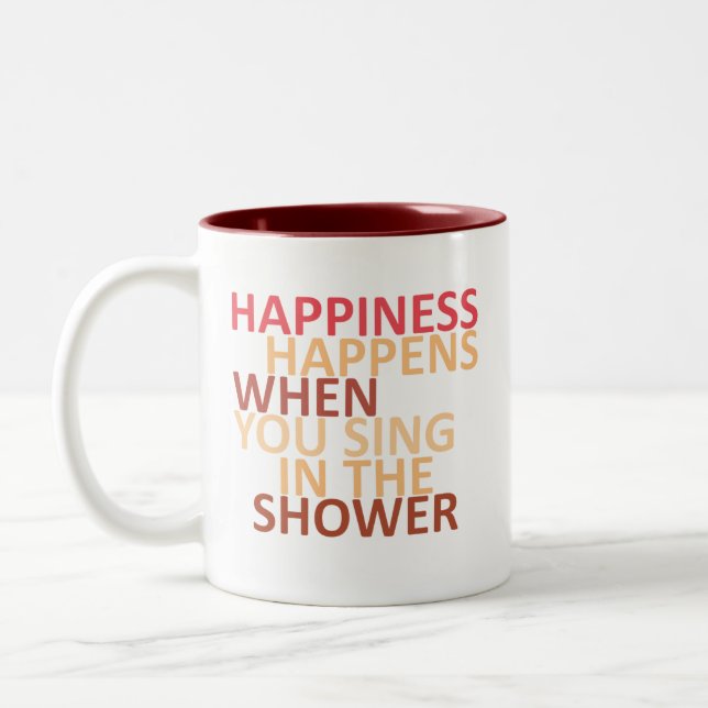 Glück passiert, wenn man in der Dusche singt Zweifarbige Tasse (Links)