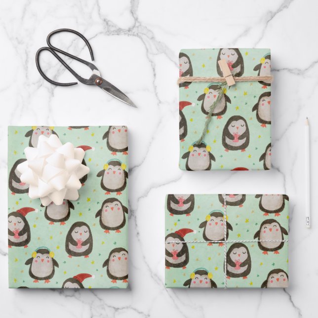 Glückliche Pinguine mit Weihnachtsmannmützen und O Geschenkpapier Set (Vorderseite)