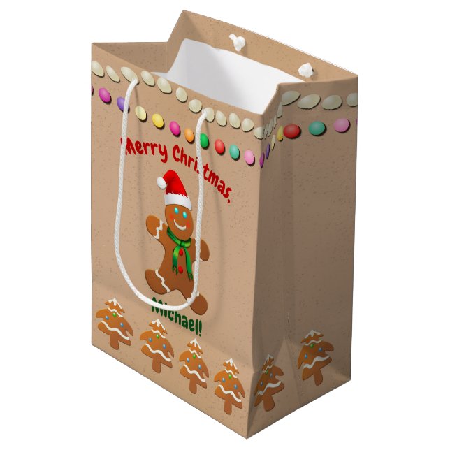 Glücklicher Lebkuchen-Junge mit Mittlere Geschenktüte (Vorderseite Schrägansicht)