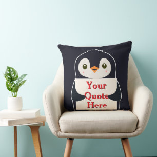 Glücklicher Pinguin, der ein Schild hält, um es zu Kissen