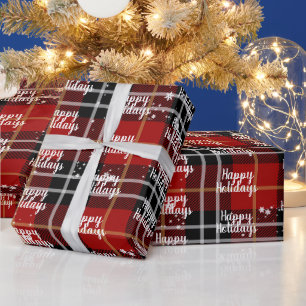 Glücklicher Urlaubstext in Schneeflocken auf Karie Geschenkpapier