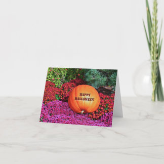 "GLÜCKLICHES HALLOWEEN PUMPKIN ZWISCHEN BLUME" KARTE