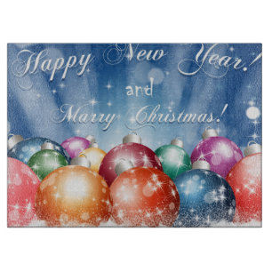 Glückliches neues Jahr und frohe Weihnachtsbaubles Schneidebrett