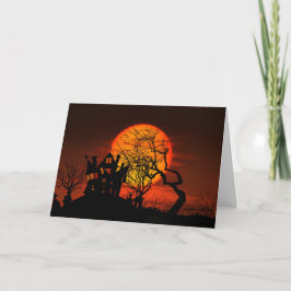 Glückliches Spuk Haus und Mond Halloweens Karte