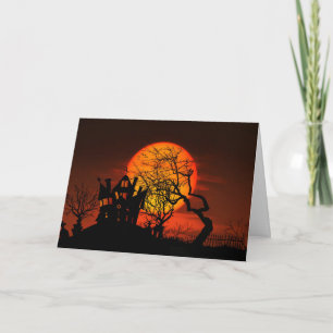 Glückliches Spuk Haus und Mond Halloweens Karte