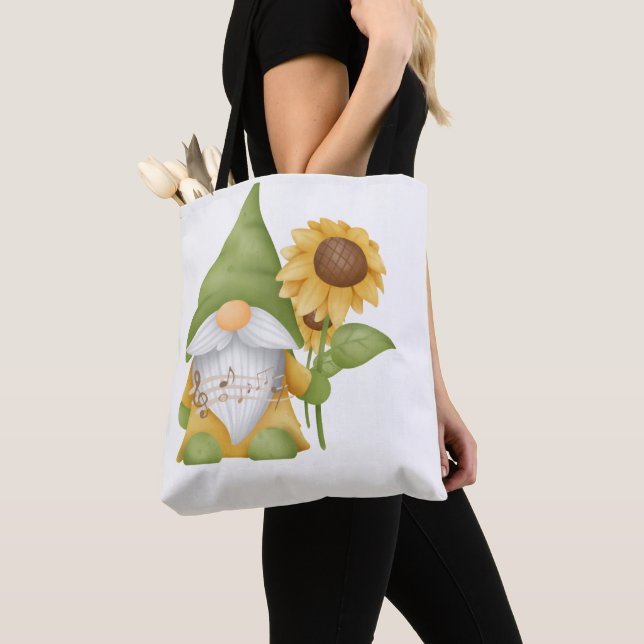 Gnome Holding a Sunflower and Notes on a Tote Bag (De près)