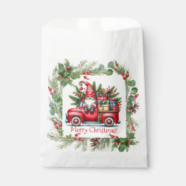 Gnome in rotem LKW gefüllt mit Geschenken Geschenktütchen