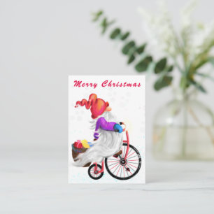 Gnome mignonne avec carte de Noël vélo