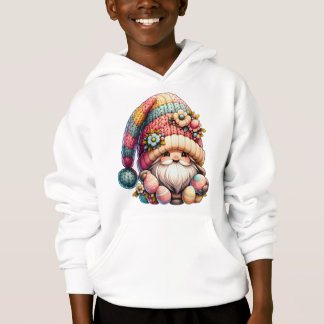 Gnome Whimsical assis avec un oeuf décoratif