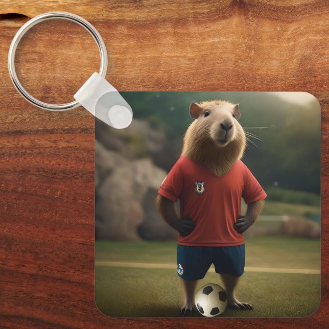 "Goal-Scoring Capybara: Der ultimative Fußballstar Schlüsselanhänger (Vorderseite)