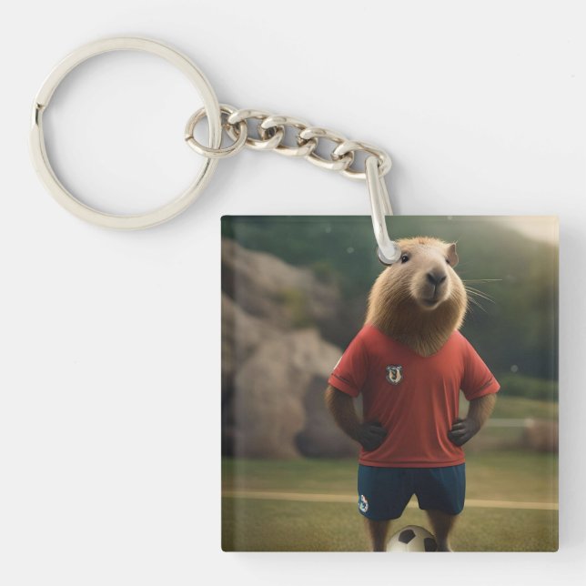 "Goal-Scoring Capybara: Der ultimative Fußballstar Schlüsselanhänger (Vorderseite)