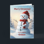 Godson Christmas Snowman Feiertagskarte<br><div class="desc">Eine festliche Winterszene,  die einen fröhlichen Schneemann in einem roten Hut und Schal zeigt. Wünschen Sie sich ein frohes Weihnachtsfest mit einer schönen Schneemannskarte.</div>