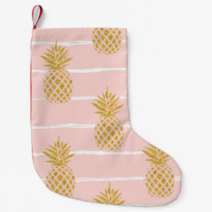 Gold Ananas, gestreift Sommer Hintergrund. Kleiner Weihnachtsstrumpf