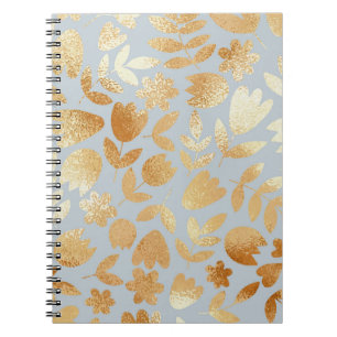 Gold Blume, blauer Hintergrund, Foliennachahmung. Notizblock
