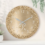 Gold Brushed Metal Glitter Monogram Name Runde Wanduhr<br><div class="desc">Easily personalize this trendy chic wall clock design featuring pretty gold sparkling glitter on a gold brushed metallic background.</div>