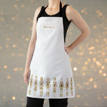GOLD CHRISTMAS NUTCRACKERS SCHÜRZE<br><div class="desc">Elegante Soldaten der Goldfresser</div>