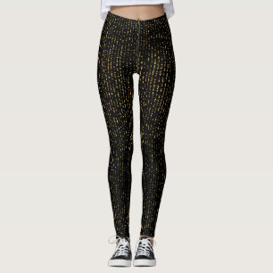 Gold-Glitzer im schwarzen Hintergrund Leggings