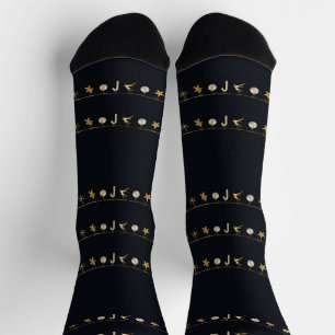 Gold hängen Weihnachtsschmuck auf schwarz Socken
