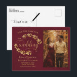 Gold Leaves Burgundy Wedding Save the Date Photo Ankündigungspostkarte<br><div class="desc">This wedding Save the Date postcard is rustic, elegant, and beautiful. It features a hand painted watercolor design with sprigs of golden laurel leaves or vines and modern script lettering on a marbled burgundy background. There is space for your photo, the couple's name, and the wedding location. The back has...</div>