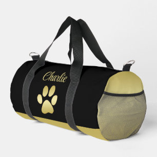 Gold Shiny Dog Paw auf schwarzem Hintergrund Duffle Bag