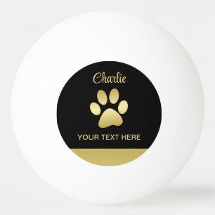 Gold Shiny Dog Paw auf schwarzem Hintergrund Tischtennisball