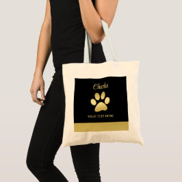 Gold Shiny Dog Paw auf schwarzem Hintergrund Tragetasche