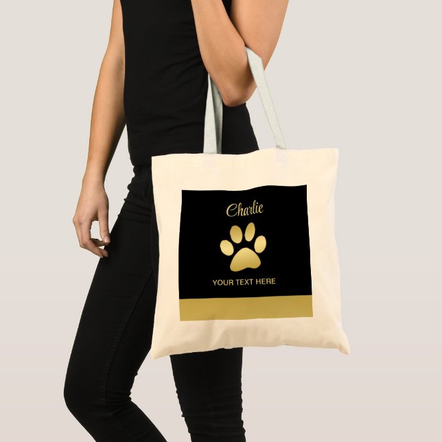 Gold Shiny Dog Paw auf schwarzem Hintergrund Tragetasche (Vorderseite (Produkt))