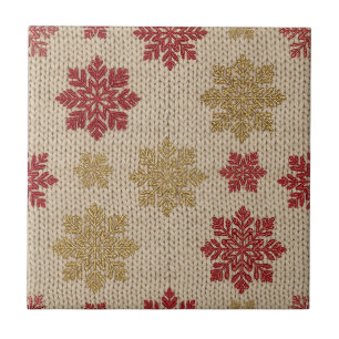 Gold- und Rot-Schneeflocken-Strickmuster auf Creme Fliese