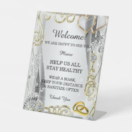 Gold Wedding Rings hört Hochzeitssicherheit Sockelschild