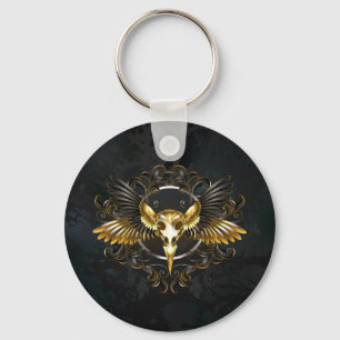 Golden Bird Skull auf schwarzem Hintergrund Schlüsselanhänger