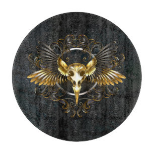 Golden Bird Skull auf schwarzem Hintergrund Schneidebrett