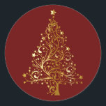 Golden Christmas Tree on Red Runder Aufkleber<br><div class="desc">Weihnachtsbaum in goldgelben Schattierungen zur Simulation von metallischem Gold. Der Weihnachtsbaum besteht aus Kehren mit Sternschmuck und mit einem goldenen Stern überragt. Set auf dunkelweihnachtrot.</div>