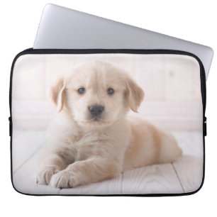 Golden retriever, das sich hinlegt laptopschutzhülle