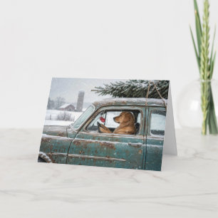 Golden Retriever in einem Retro-Auto mit Kiefer Karte