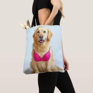 Golden Retriever mit rosa BH Tasche