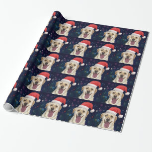 Golden retriever mit rotem Weihnachtsmann-Hut Geschenkpapier