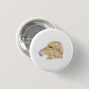 Golden Retriever Welpe spielt mit Geist Button