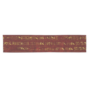 Goldene ägyptische Hieroglyphen auf rotem Leder Kurzer Tischläufer