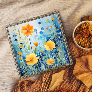Goldene Blume auf einem hellblauen Hintergrund Fotodruck