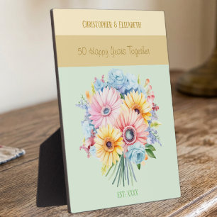 Goldene Blume zum 50. Jubiläum geben grüne Namen Fotoplatte