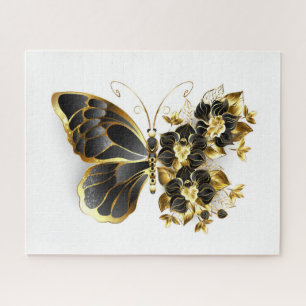 Goldene Blumen Schmetterling mit schwarzer Orchide