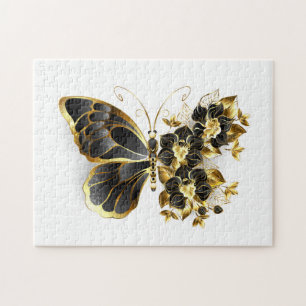 Goldene Blumen Schmetterling mit schwarzer Orchide