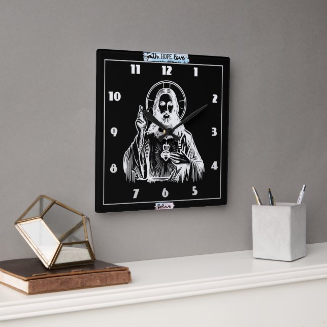Goldene Darstellung Jesu in religiöser Kunst Quadratische Wanduhr (Büro)