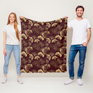 Goldene Ginkgoblätter auf roter eleganter Botanik Fleecedecke