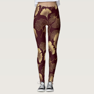 Goldene Ginkgoblätter auf roter eleganter Botanik Leggings