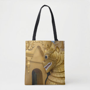 Goldene Löwenstatue am Tempel Tasche